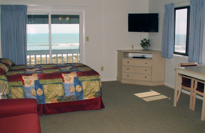 Guest room at Beach House Inn and Suites.