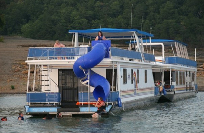 Houseboat with water slide boat at Jamestown Resort and Marina.