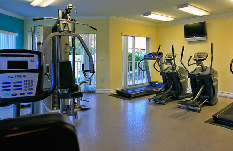 Fitness center and business center at Sunset Vistas.