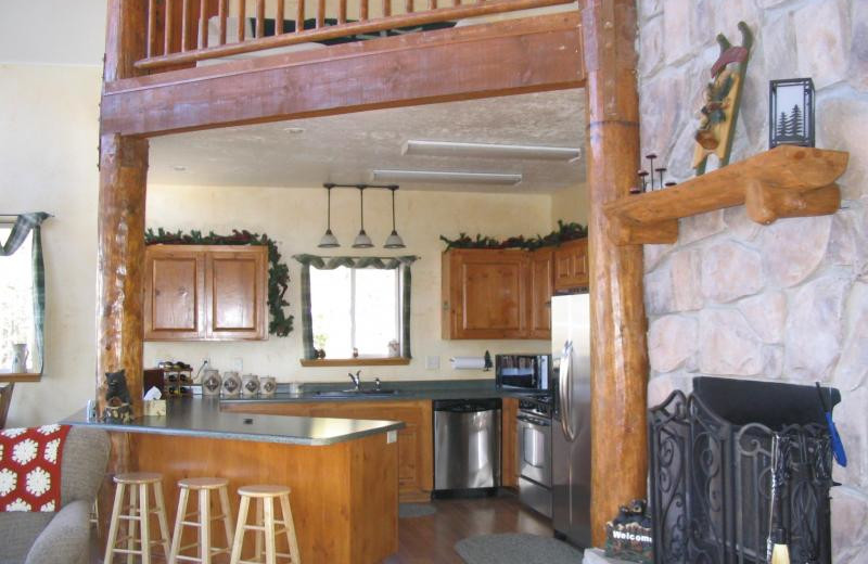 Cabin kitchen at Lori's Luxury Rentals.