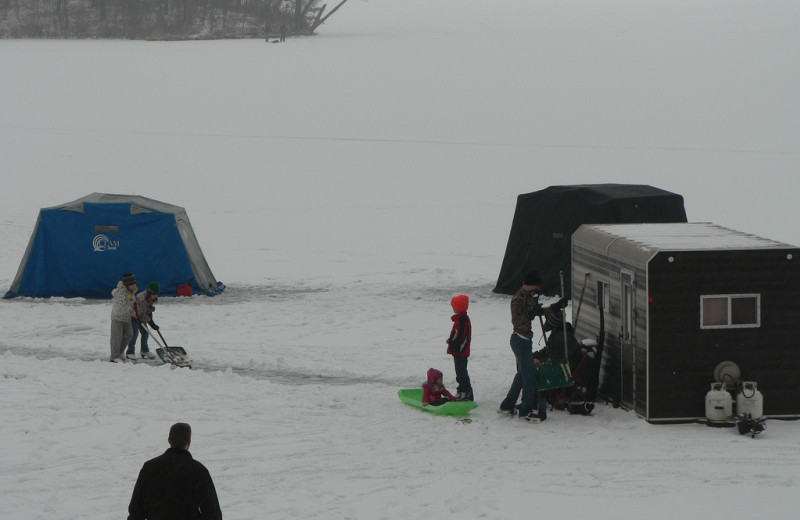Ice fishing at Woodland Beach Resort.