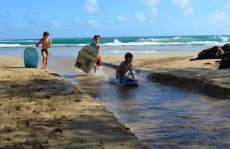 Playing on the beach at Great Vacation Retreats.