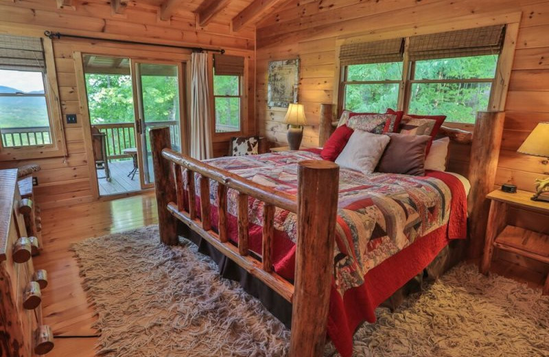 Rental bedroom at Blue Sky Cabin Rentals.