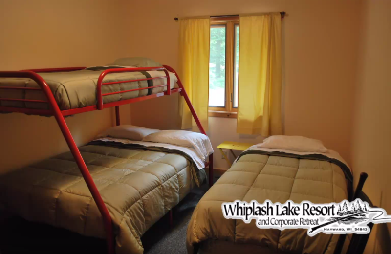 Cabin bedroom at Whiplash Lake Resort.