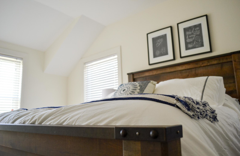 Cottage bedroom at Owl's Nest Resort & Golf Club.