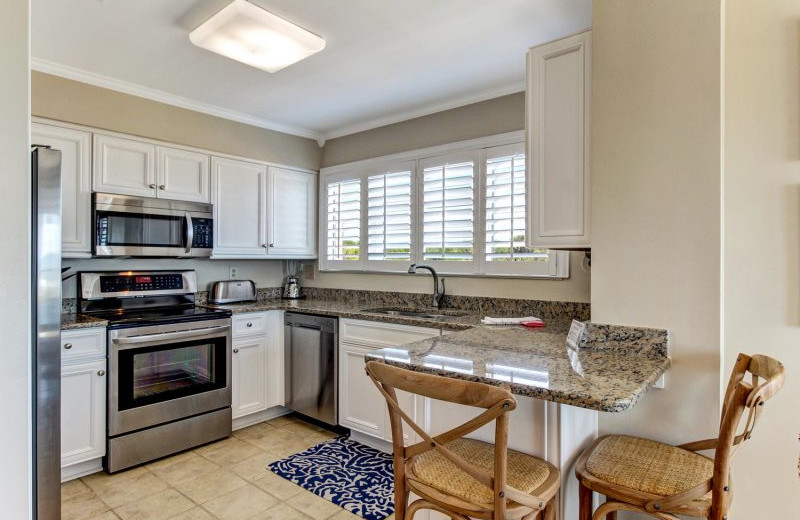 Rental kitchen at Beach Vacation Rentals.
