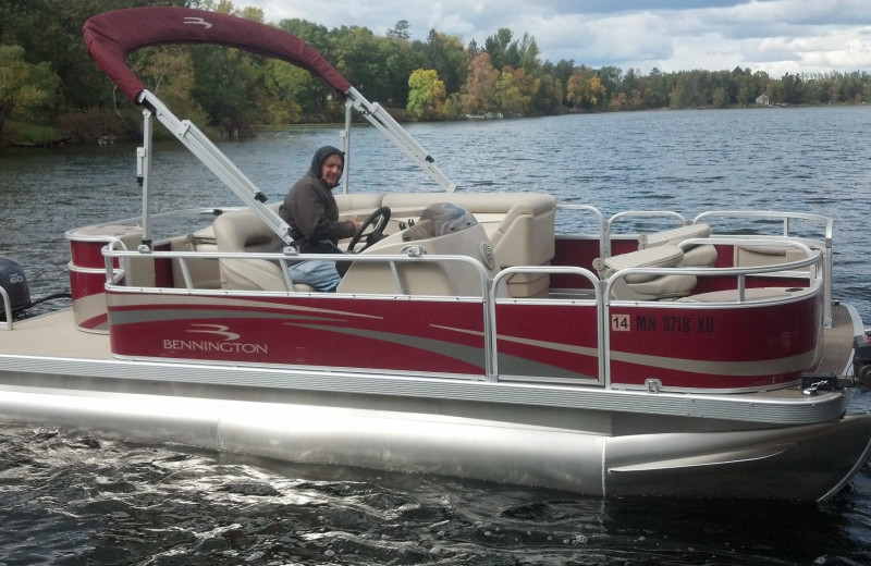 Boating at Breezy Point Resort on Straight Lake.