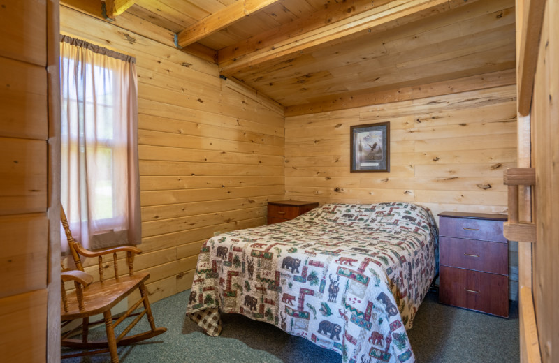 Cabin bedroom at Rising Eagle Resort.