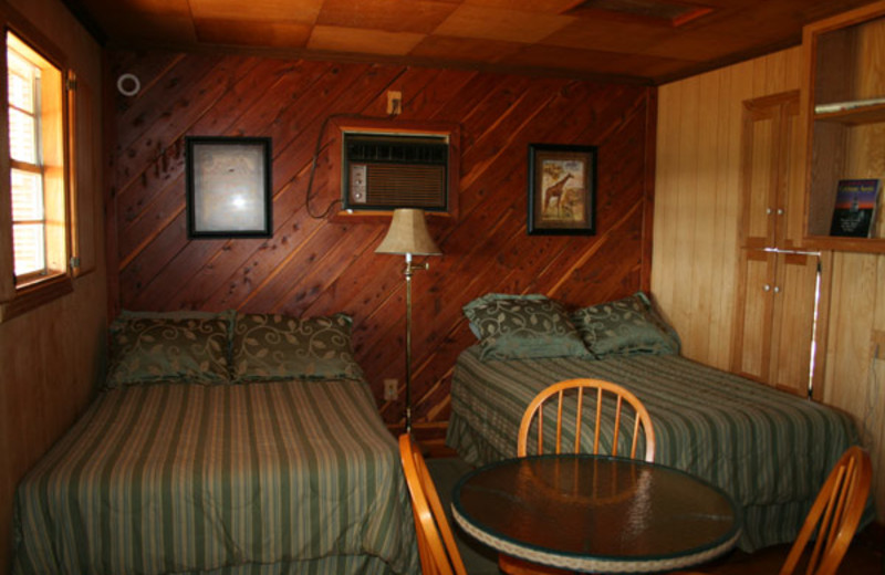 Cabin bedroom at The Exotic Resort Zoo.