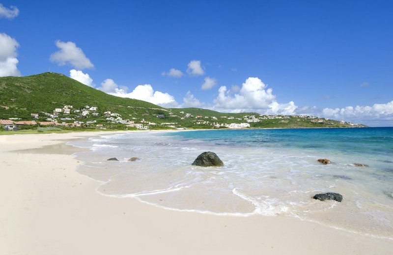 The beach at Island Properties Luxury Rentals.