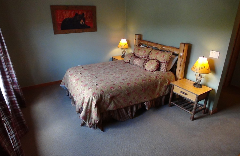 Guest bedroom at Ampersand Bay Resort & Boat Club's Heron Creek Townhomes.