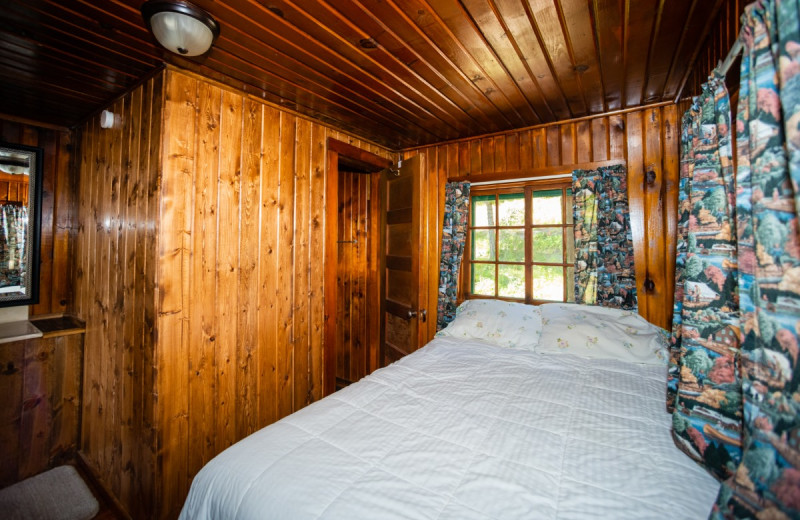 Cabin bedroom at North Shore Lodge & Resort.