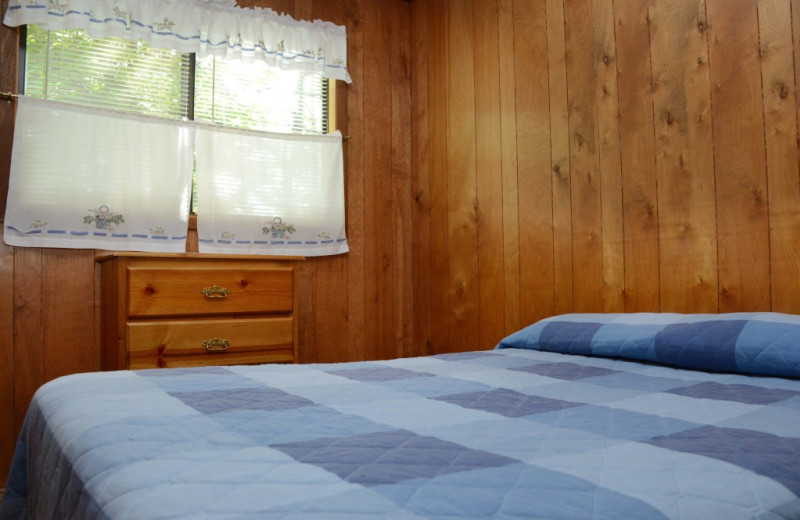 Cabin bedroom at Riverside Resort.