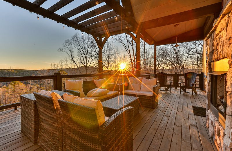 Cabin deck at Mountain Oasis Cabin Rentals.