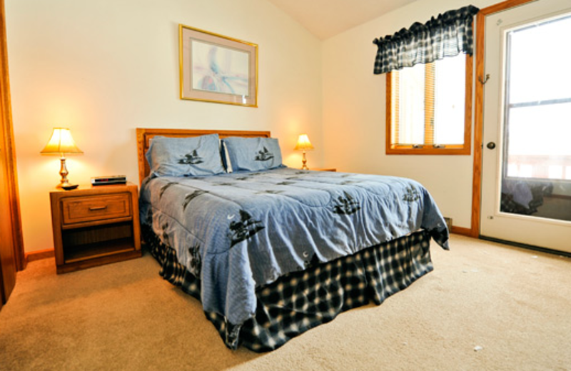 Vacation rental bedroom at Deerfield Village Resort.