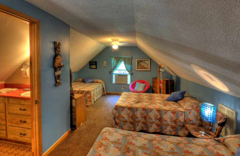Cabin bedroom at Hidden Creek Cabins.