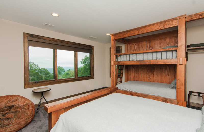 Cabin bedroom at Blue Ridge Vacation Cabins. 