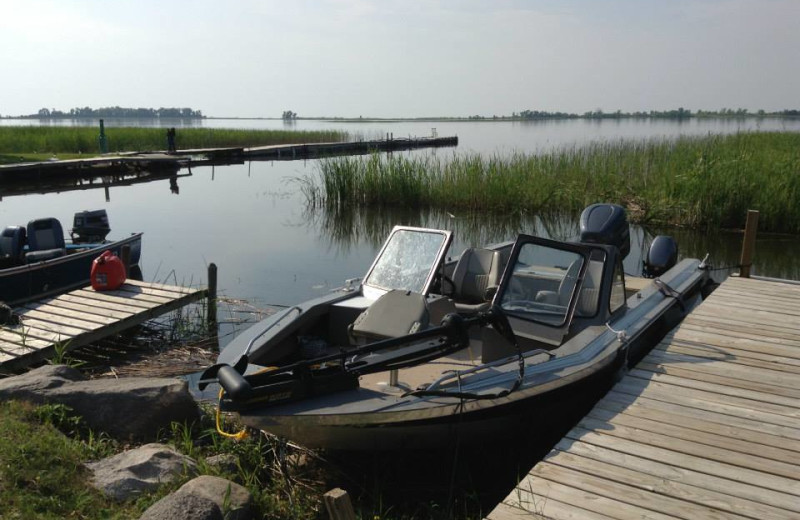 Fishing boat and dock at Harris Hill Resort.