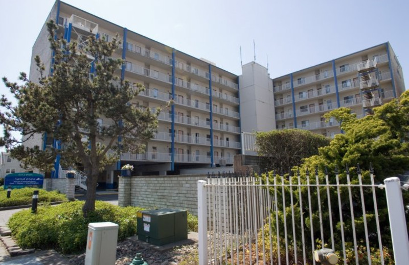 Exterior view of Sand & Sea Condominums.