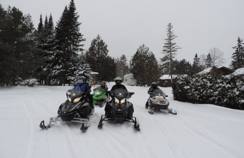 Snowmobiling at Owls Nest Lodge.