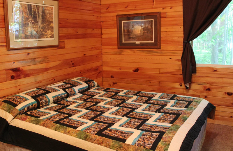 Cabin bedroom at Pine Beach Resort-Side Lake.