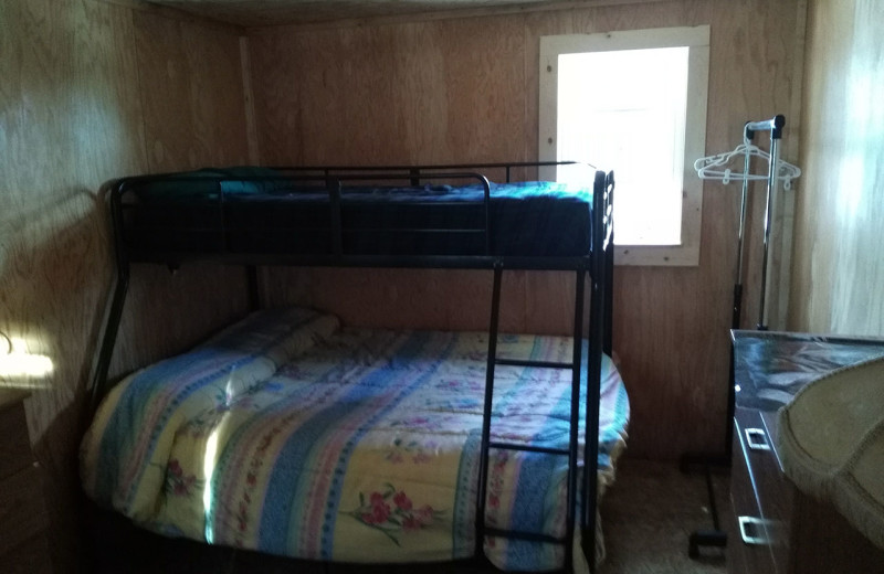 Cabin bedroom at Hungry Moose Bed and Breakfast.