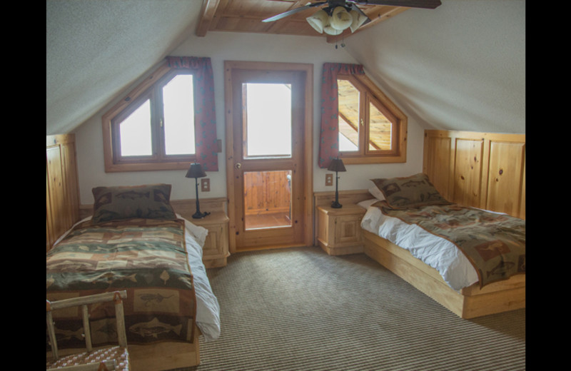 Cabin bedroom at Obabika Resort.