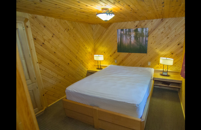 Cabin bedroom at Obabika Resort.