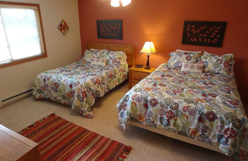 Cottage bedroom at A-Ga-Ming Golf Resort.