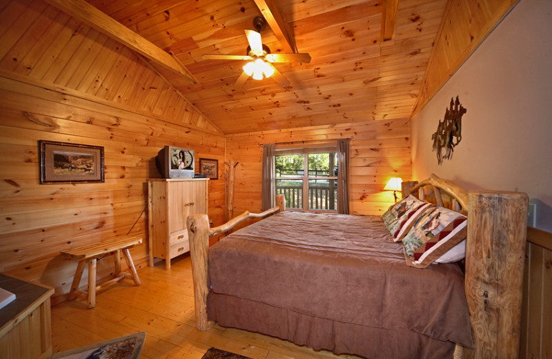 Cabin bedroom at SmokyMountains.com.