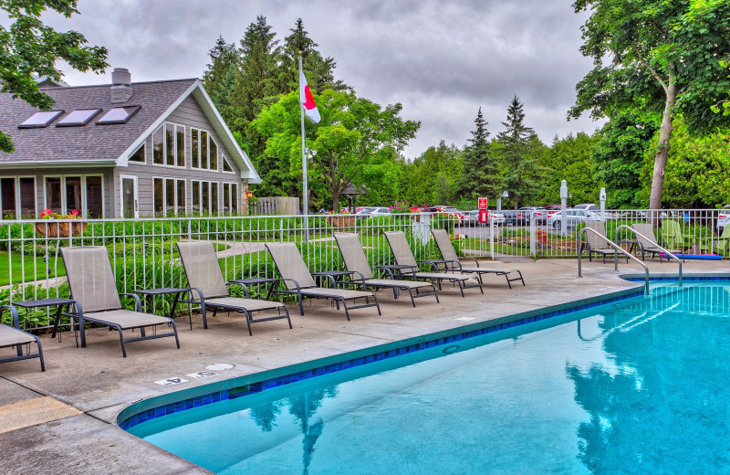 Outdoor pool at Waterbury Inn Condominium Resort.