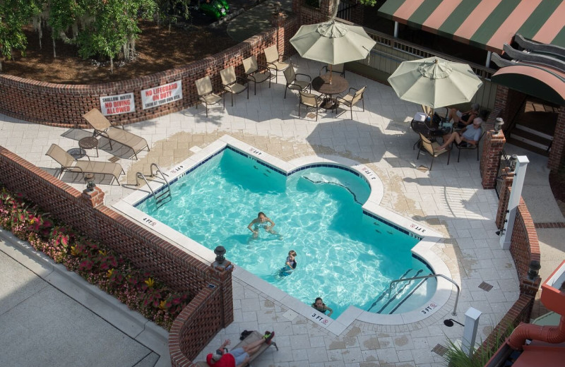 Seasonal outdoor pool at Inlet Sports Lodge. Enjoy a cocktail at the adjacent outdoor bar from on-site restaurant & bar, Costa.