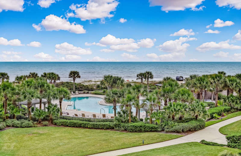 Rental outdoor pool at Amelia Rentals and Management Services.