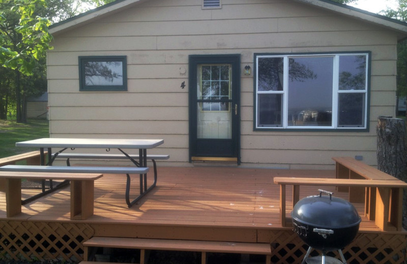 Cabin exterior at Whispering Pines Resort.