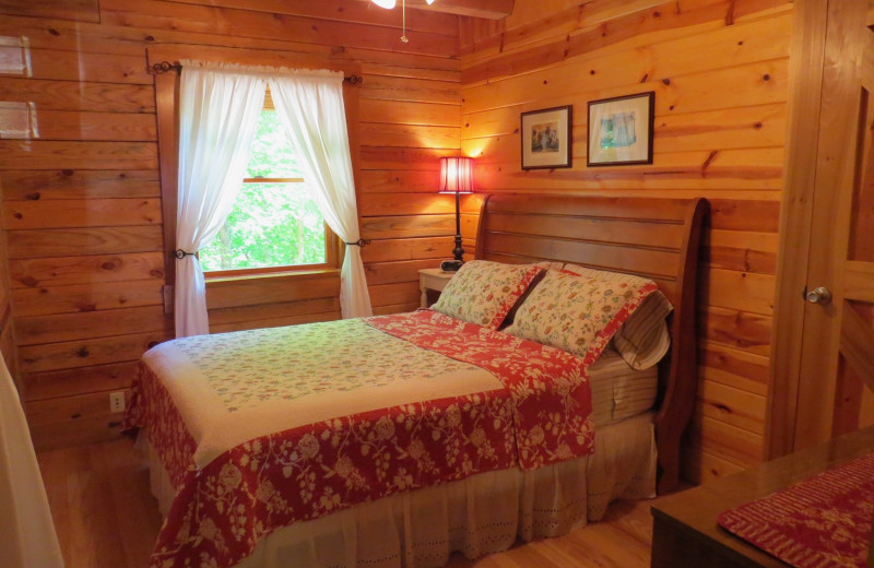 Cabin bedroom at Creeks Crossing Cabins.