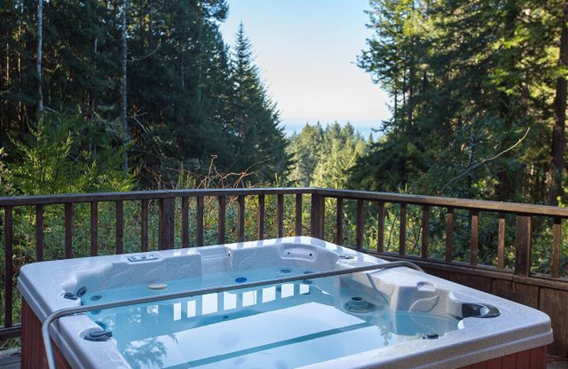 Rental hot tub at Sea Ranch Lodge Vacation Rentals.