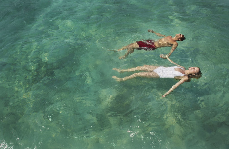 Swimming at Tranquility Bay Beach House Resort.