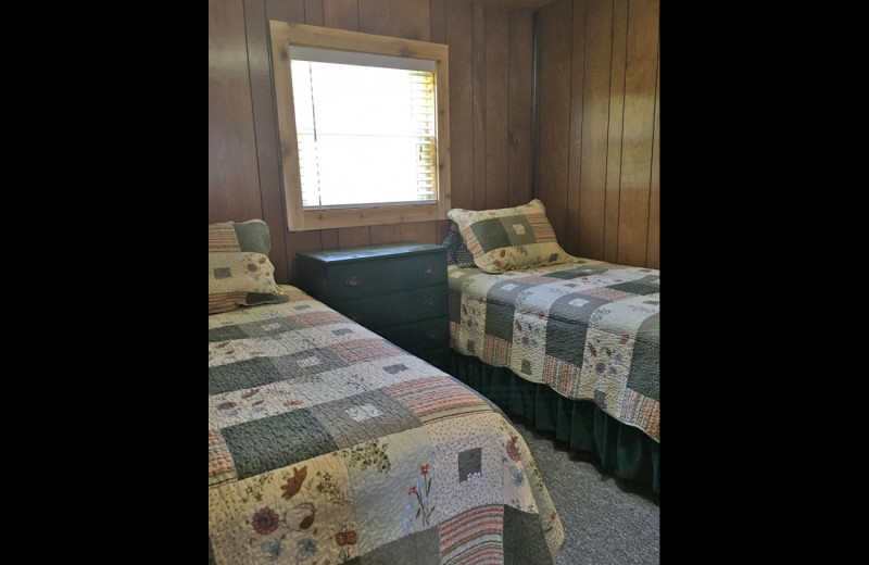 Cabin bedroom at Sullivans Resort & Campground.