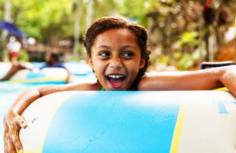 Kid in tube at Westgate Lakes Resort & Spa.