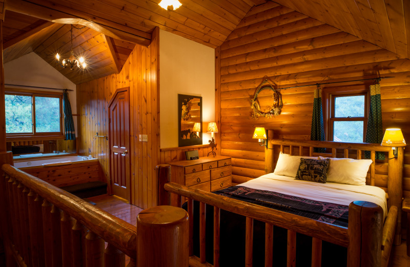 Cabin bedroom at Baker Creek Mountain Resort.