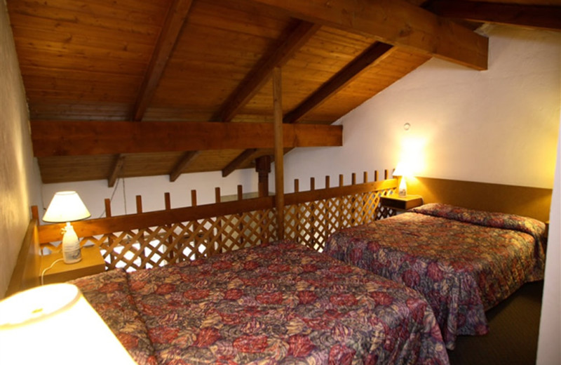 Guest loft bedroom at Sandpiper Beach Resort.