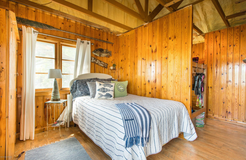 Cabin bedroom at Sybil Shores Resort.