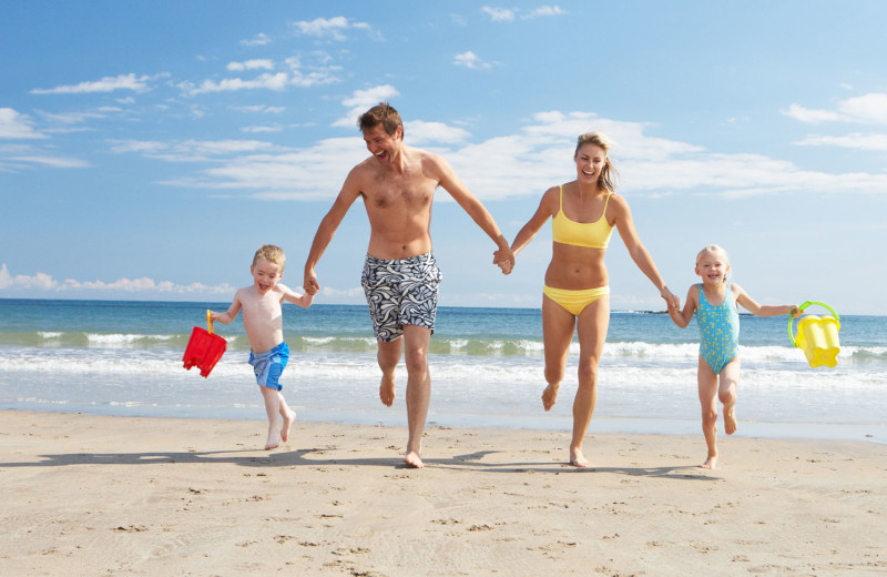 Family on beach at Seabreeze I.