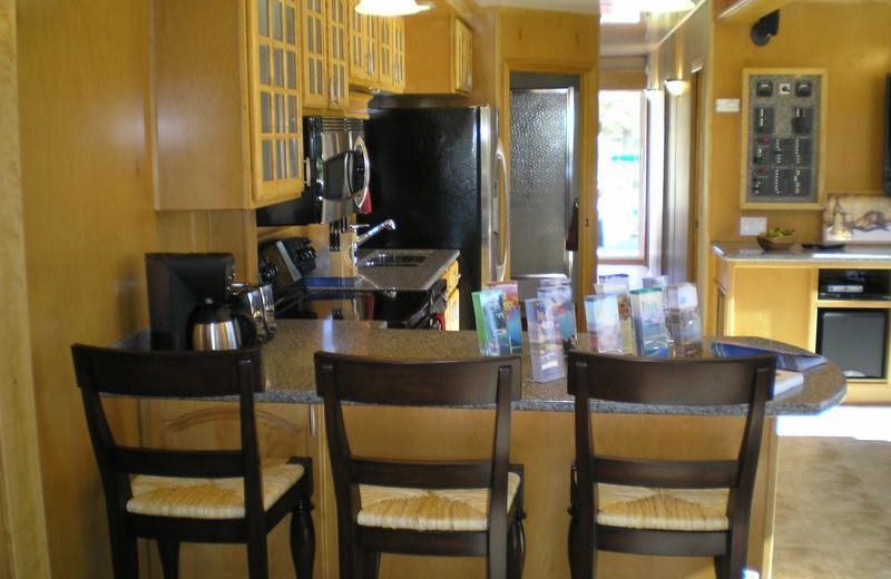 The 70' Gold houseboat dining table at Antelope Point.