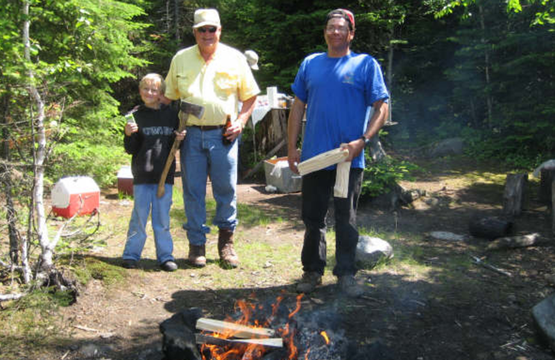 Making the fire at Sandy Beach Lodge.