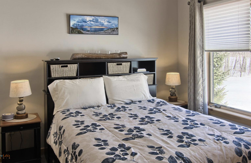 Cottage bedroom at Hawk's Eye Golf Resort.