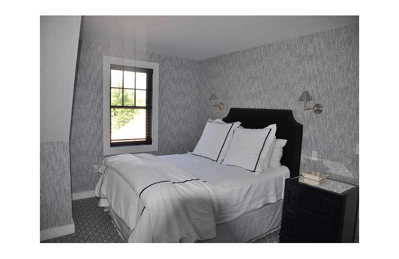 Rental bedroom At the Lakes Vacation Rentals.
