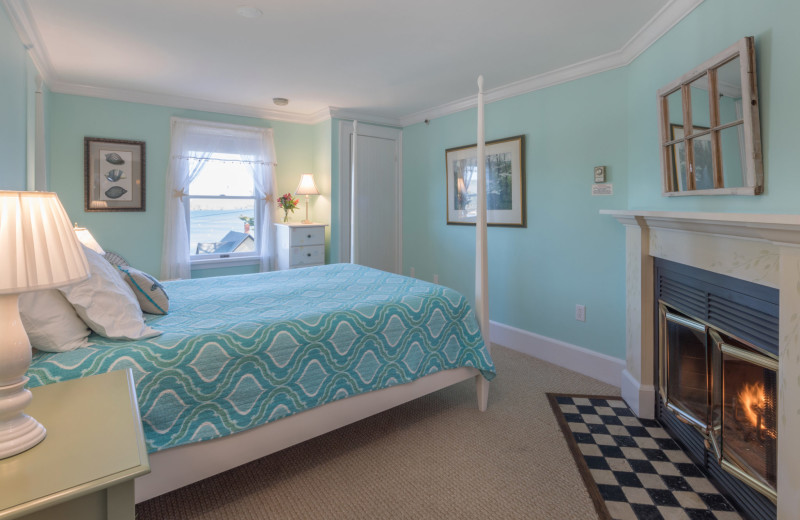 Guest room with fireplace at Five Gables Inn.