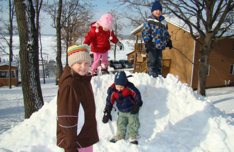 Kids playing in the snow at Train Bell Resort.