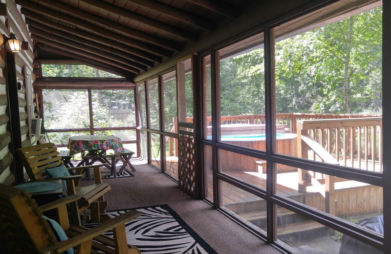 Rental porch at Stay Waterfront - Cheat River Lodge & Cabins.